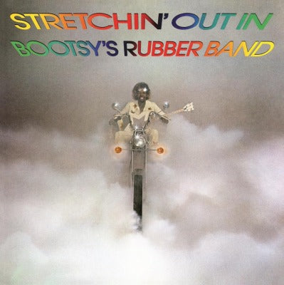 Album cover for 'Stretchin' Out in Bootsy's Rubber Band' featuring a colorful title text and an image of a person on a motorcycle against a cloudy backdrop.