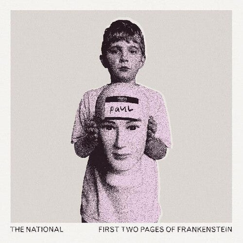 Album cover art for The National's First Two Pages of Frankenstein LP featuring a black and white photograph of a young boy holding a sign with the album name.