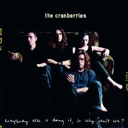 The Cranberries band members in a group pose, with the band name and album title 'Everybody Else Is Doing It, So Why Can't We?' displayed.