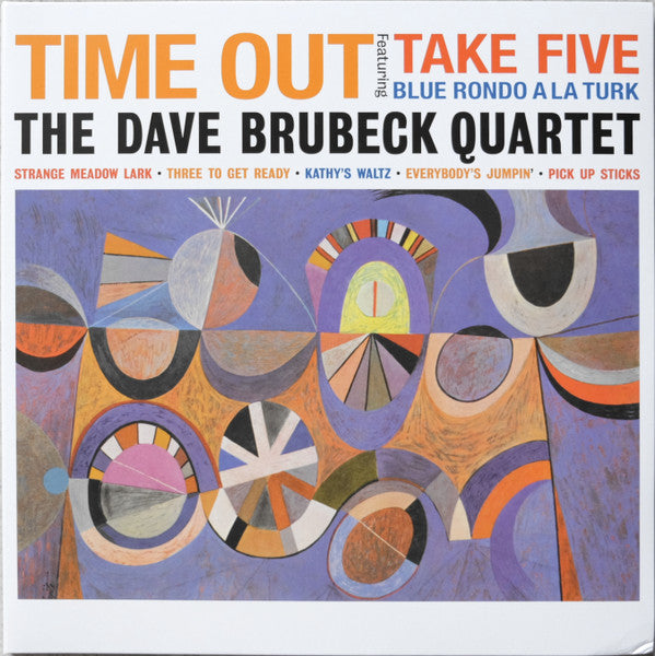 Album cover for The Dave Brubeck Quartet's 'Time Out' LP featuring abstract art in a vibrant color palette.
