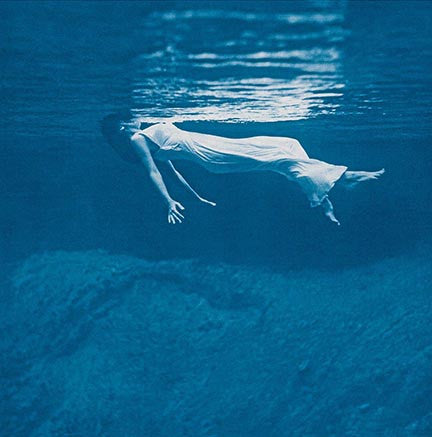 A vinyl record titled 'Undercurrent' featuring an image of a person swimming underwater on the cover.