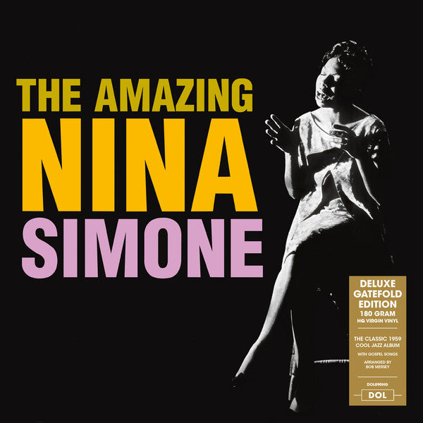 Album cover for Nina Simone's album 'The Amazing Nina Simone' featuring a black and white photograph of Nina Simone playing the piano with text overlay.