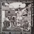 Album cover art for Crass - The Feeding Of The Five Thousand LP featuring a black and white illustration of a crowd of people around a statue, with the band's name and album title text.