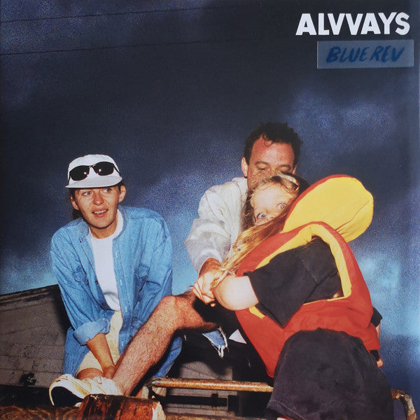 Cover art for Alvvays album Blue Rev, featuring a photograph of three individuals sitting close together with a backdrop of a dark sky with clouds.