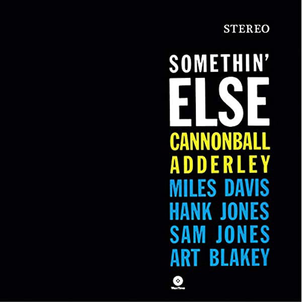 Album cover for Cannonball Adderley - Somethin' Else LP featuring a black background with white and blue text that includes the artist's name and the tracklist.