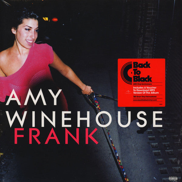 Amy Winehouse album cover for 'Frank LP' featuring a black and white photo of the artist with a red and white label in the center.