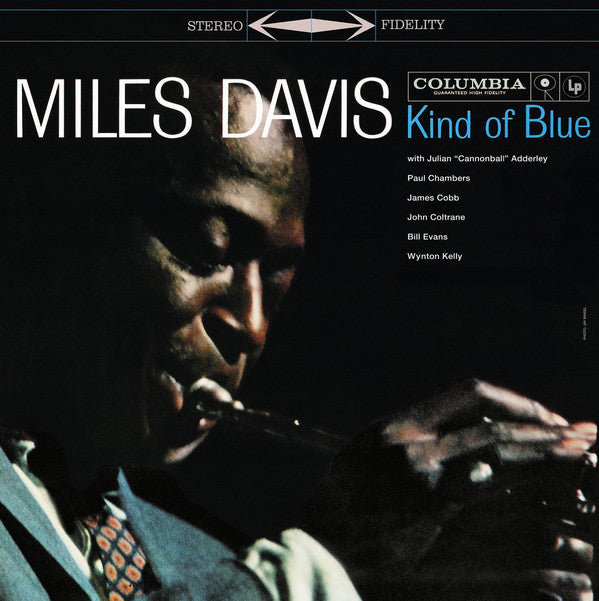 Miles Davis - Kind Of Blue album cover featuring a black and white photograph of Miles Davis playing a trumpet.