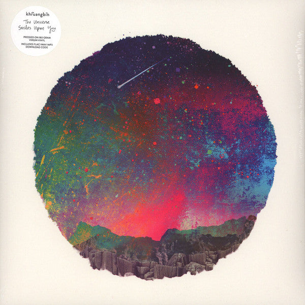 Album cover art for Khruangbin featuring a colorful abstract design resembling a starry sky over a landscape.