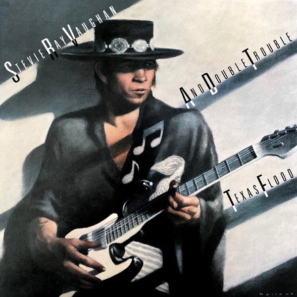 Album cover of Stevie Ray Vaughan and Double Trouble's 'Texas Flood' featuring a painting of Stevie Ray Vaughan with a guitar and a hat.