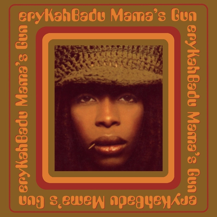Album cover for Erykah Badu's 'Mama's Gun' featuring a photo of Erykah Badu in a hat with a reddish-orange color scheme.