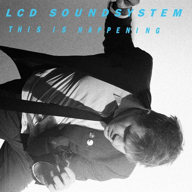 Black and white album cover featuring a person lying down, with the LCD Soundsystem bandcamp title 'This Is Happening' printed above.
