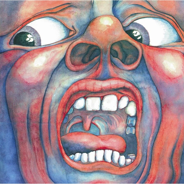 Album cover art for King Crimson - In The Court Of The Crimson King featuring a close-up, distorted image of a human face.