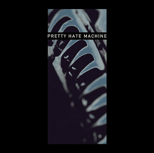 An album cover featuring a close-up of what appears to be a mechanical device, possibly a part of industrial equipment, with the text 'PRETTY HATE MACHINE' displayed.