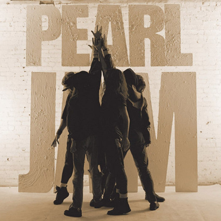 Silhouette of Pearl Jam band members holding up records with the band's name in the background.