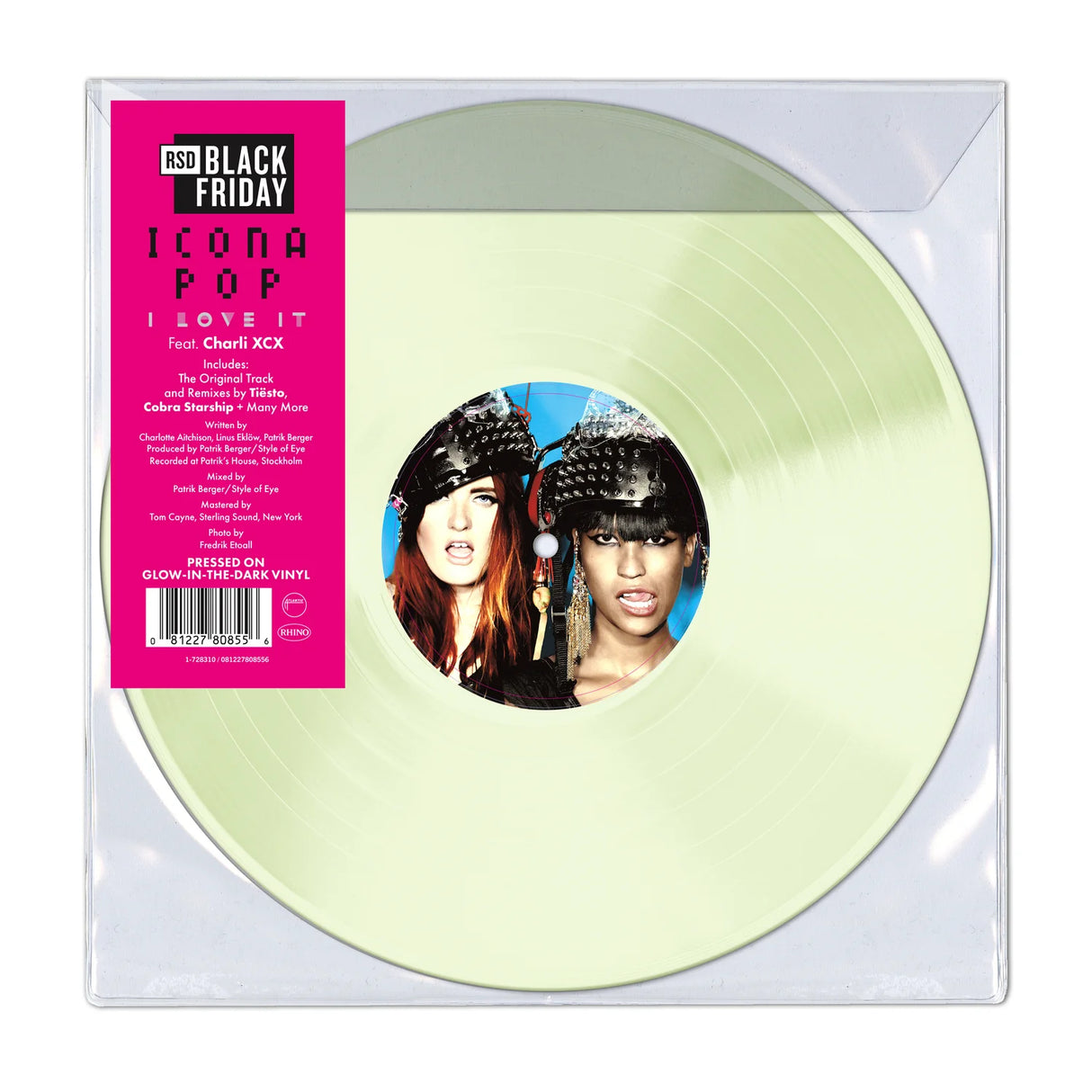 Vinyl record with a pink label featuring two individuals, enclosed in clear packaging.