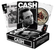 Johnny Cash-themed playing cards with a box featuring images and text related to the musician.