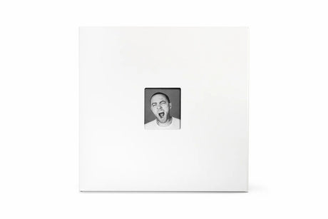 White photo album with a black and white photo of a person on a white background