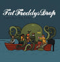 Album cover for 'Fat Freddy's Drop' with a boat and characters on a blue background
