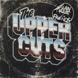 Album cover for 'The Upper Cuts' featuring stylized text and a logo on a textured background.