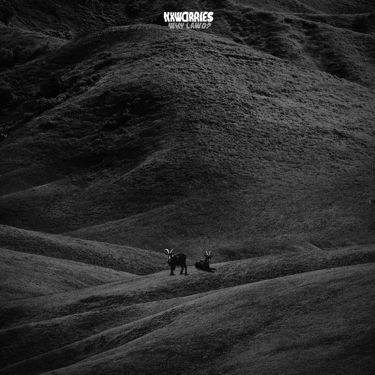 Two animals on a hillside with a dark, textured background