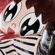 A close-up of a colorful vinyl record with a cartoonish character design, predominantly featuring eyes and hearts, in a striped background.