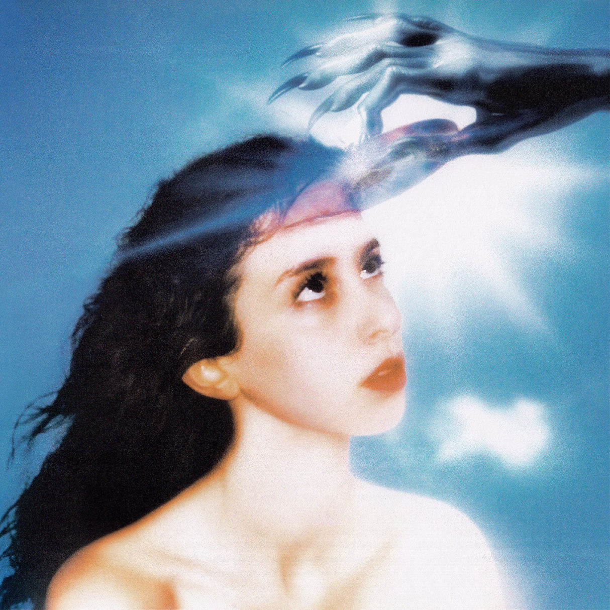 Album cover art for Magdalena Bay featuring a light blue vinyl record with a abstract and ethereal design.