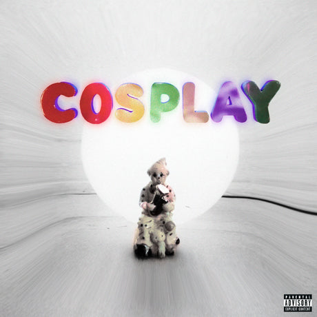 Toy figure with colorful 'COSPLAY' text on a white background
