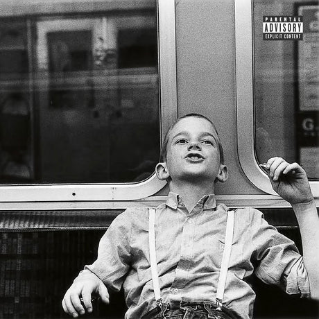 Black and white album cover with a child sitting on a bus, featuring a parental advisory label.