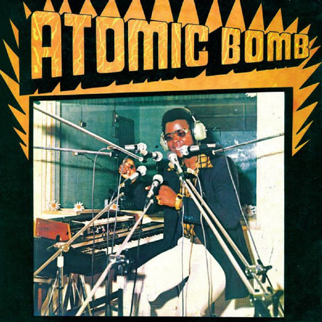 Album cover with two musicians in a studio and 'Atomic Bomb' text.