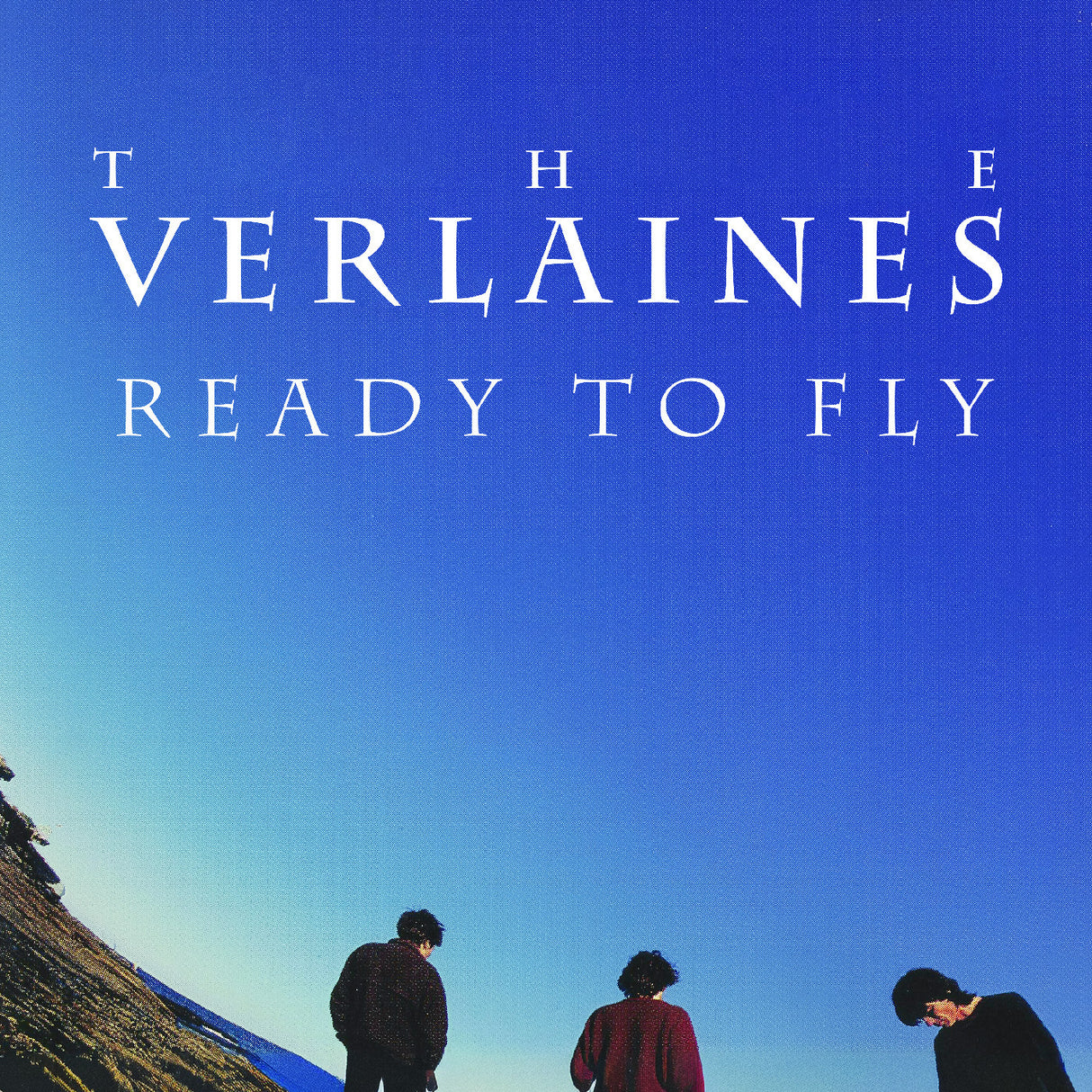 Album cover with 'The Verlaines Ready to Fly' text against a blue sky with three people on a hill.