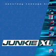 Album cover for 'Saturday Teenage Kick' by Junkie XL with blue gradient and text design.
