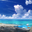 Boat on a sandy beach with turquoise ocean and blue sky