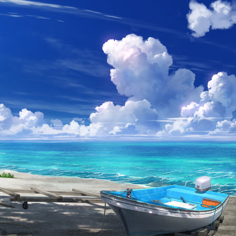 Boat on a sandy beach with turquoise ocean and blue sky