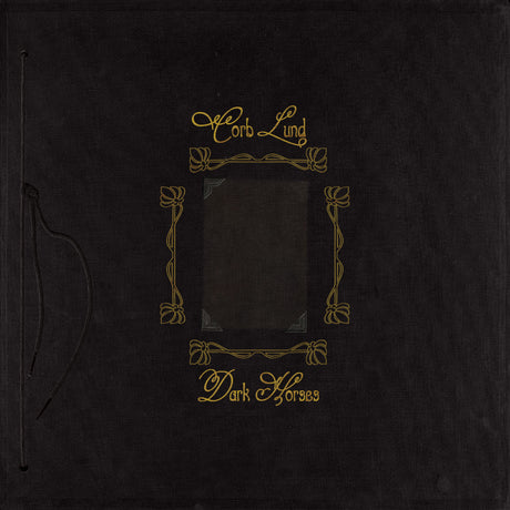 Black album cover with gold text and design elements