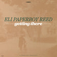 Album cover for 'getting there' by Eli Paperboy Reed with a sepia-toned scene of a person walking a dog.