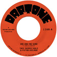 Orange vinyl record label with black text for 'One and the Same' by Thee Sacred Souls & Victor Axelrod