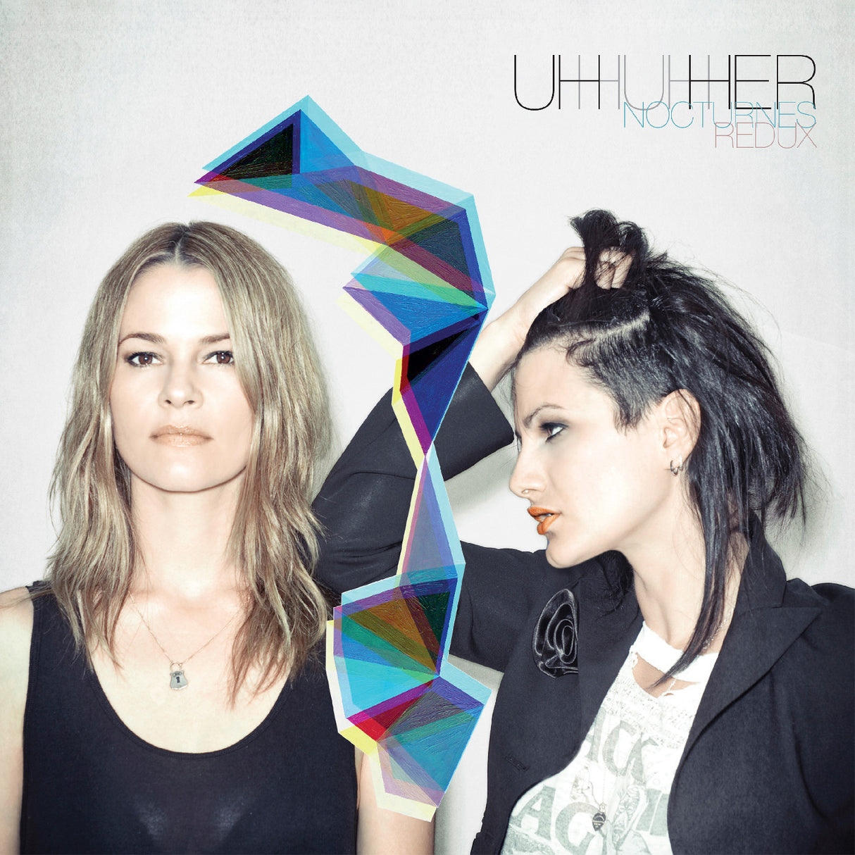 Two women with a colorful geometric design and album cover text on a white background