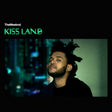 Album cover for 'Kiss Land' by The Weeknd with a person looking away against a blurred cityscape.