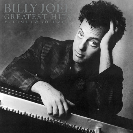 Album cover featuring Billy Joel with text 'Billy Joel Greatest Hits Volume I & Volume II' on a gray background.