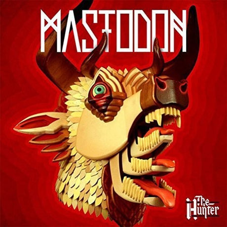 Album cover with a stylized animal head design on a red background, featuring the band 'Plastikdon' and the title 'The Hunter'.