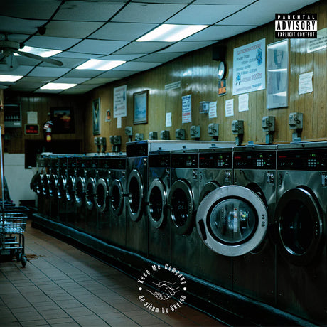 Laundry room with rows of washing machines and a parental advisory label on the top right corner.