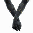 Black gloves with gold accents on a white background