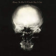 X-ray of a skull on a black background with text at the top.