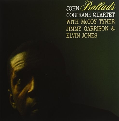 Album cover of 'John Coltrane Quartet with McCoy Tyner, Jimmy Garrison & Elvin Jones' featuring a silhouette.
