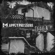 Black and white image of a house with 'Apply Pressure' sign overlay