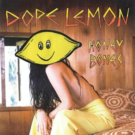 Album cover with a lemon character and text 'Dope Lemon Honey Bones' on a wooden background.