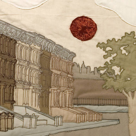 Embroidered scene of a building with a red sun and tree