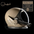Beige helmet with clear visor on a black background, featuring the Clutch logo.