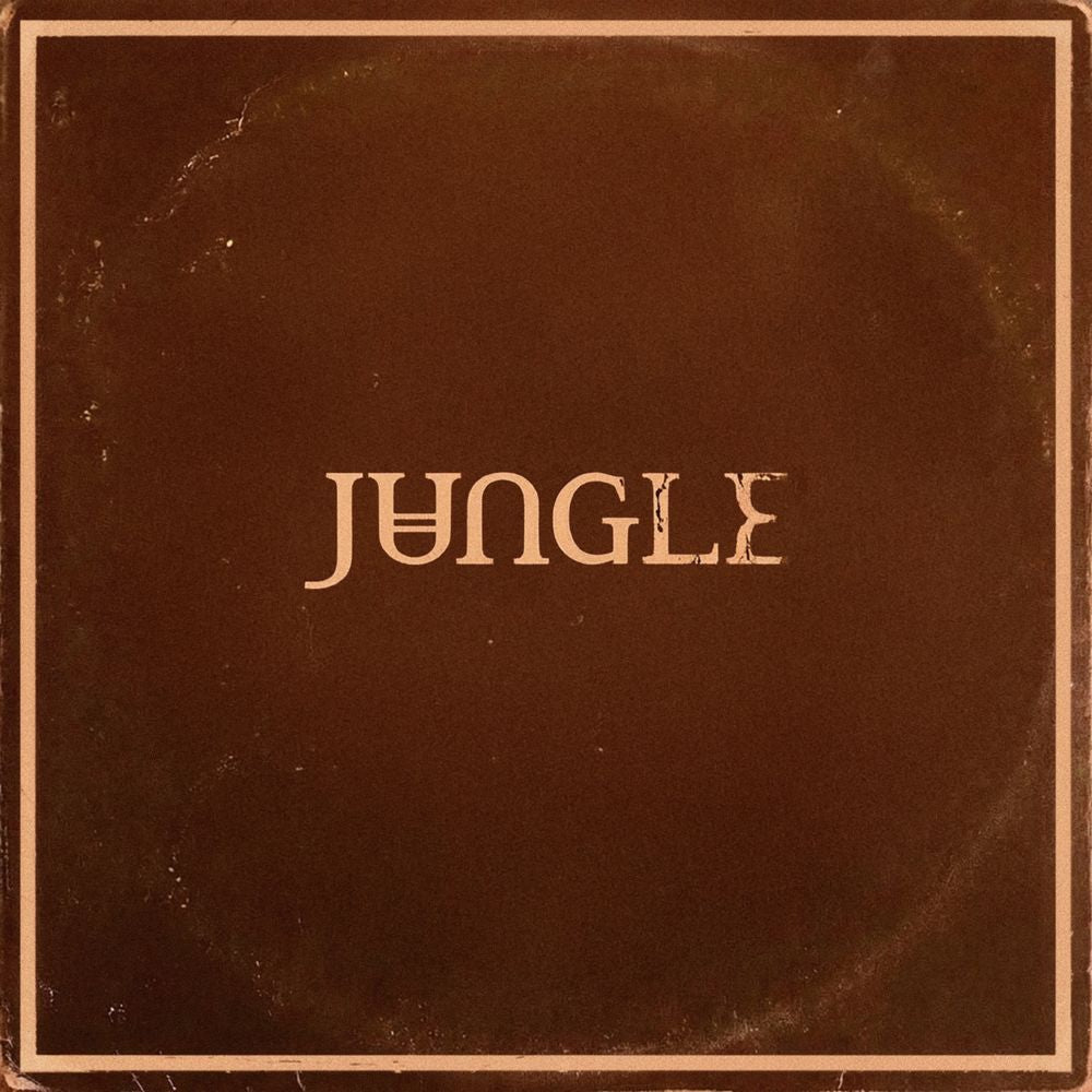 A square brown album cover or box with the word "JUNGLE" centered in a stylized beige serif font, surrounded by a thin beige border and showing a distressed, vintage texture.