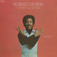Album cover with a person in front of a red background and text 'Roberto Roena Y Su Apollo Sound Lucky 7'.